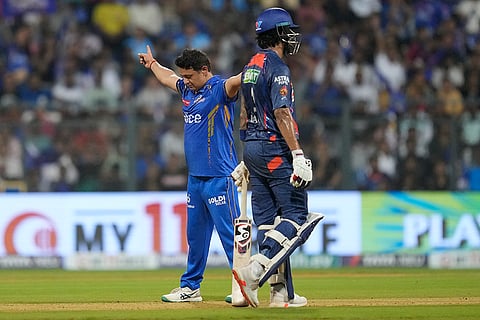 Piyush Chawla celebrates Marcus Stoinis wicket